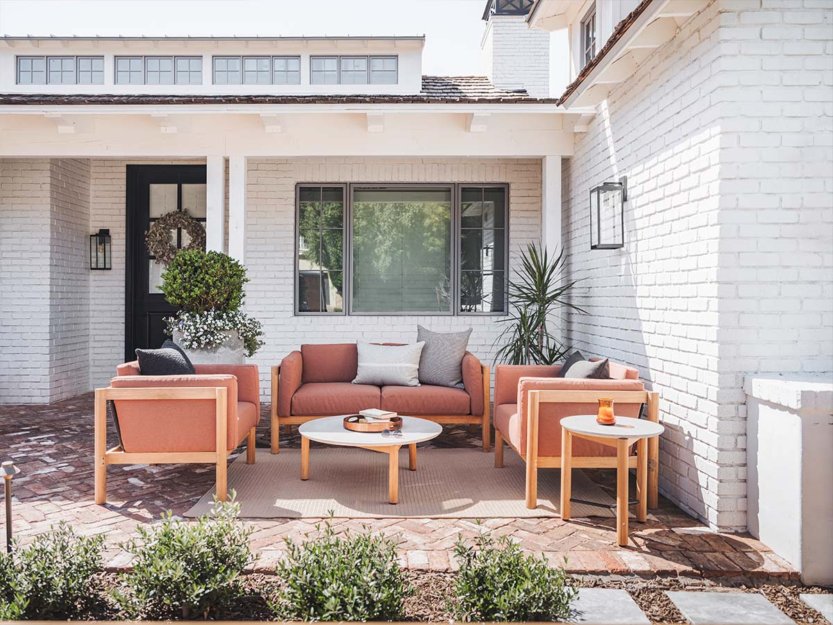 beautiful orange patio set in front of a home