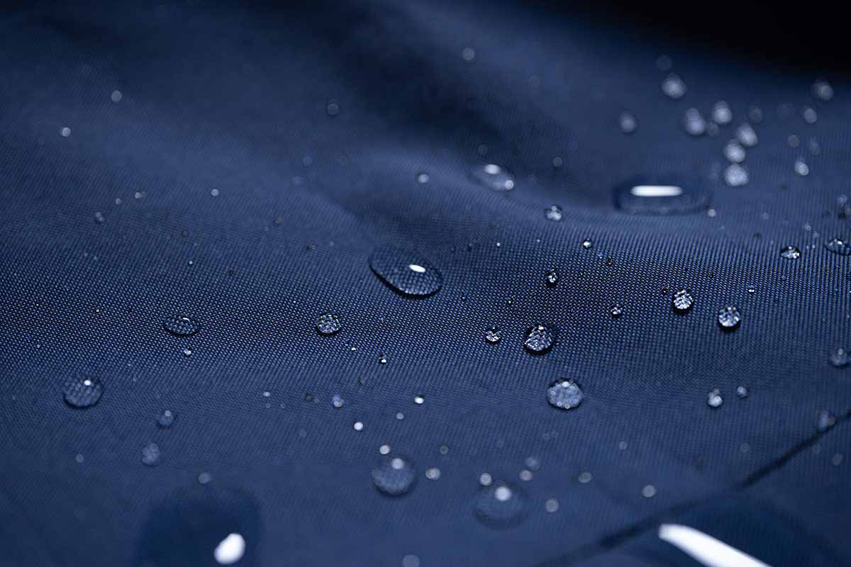droplets of water on a blue fabric